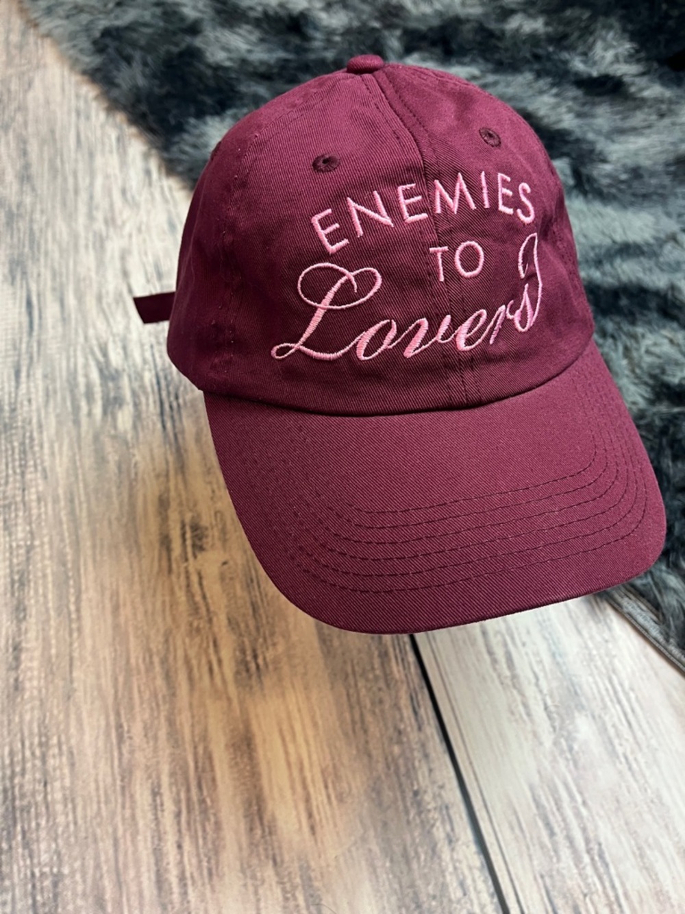 Embroidered "Enemies to Lovers" Baseball Cap by 832 Stories